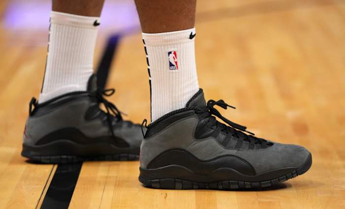 Miami Heat forward P.J. Tucker wears the Air Jordan 10 'Shadow' sneakers against the Memphis Grizzlies on December 6, 2021.